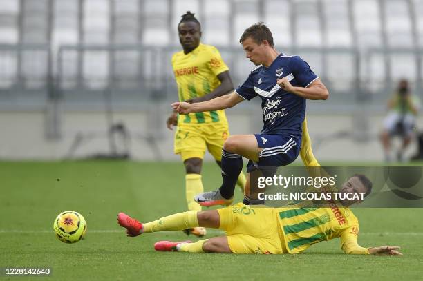 Bordeaux's French forward Nicolas De Preville vies with Nantes' midfielder Pedro Chirivella during the French L1 football match between Girondins de...
