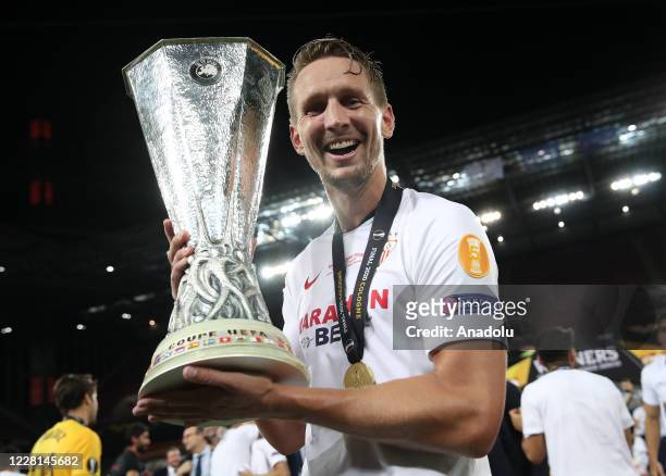 Luuk de Jong of Sevilla celebrates their victory with the trophy after his team crowned 2020 UEFA Europa League champions with a 3-2 win against...