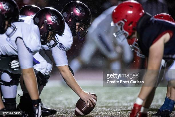 Players ready for a snap as Lipscomb Academy plays football against Brentwood Academy on August 21, 2020 in Brentwood, Tennessee. High school...
