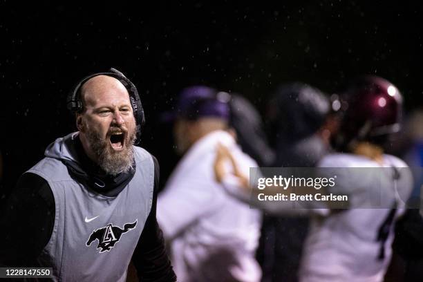 Head coach Trent Dilfer of Lipscomb Academy instructs his players during a football game against Brentwood Academy on August 21, 2020 in Brentwood,...