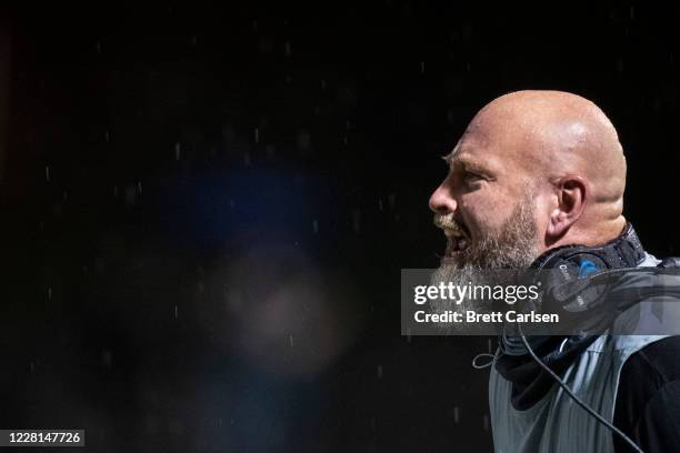 Head coach Trent Dilfer of Lipscomb Academy instructs his players during a football game against Brentwood Academy on August 21, 2020 in Brentwood,...