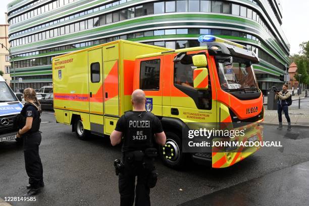 German army ambulance presumably carrying Russian opposition figure Alexei Navalny arrives on August 22, 2020 to Berlin's Charite hospital, where...