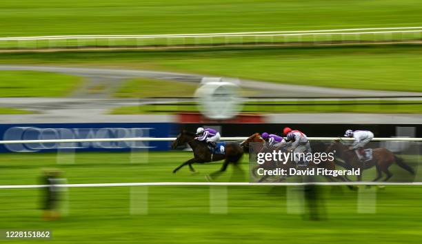 Kildare , Ireland - 22 August 2020; High Definition, with Wayne Lordan up, left, pull away from the pack on their way to winning the Irish Stallion...