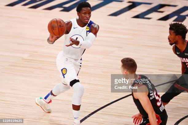Victor Oladipo of the Indiana Pacers passes the ball against the Miami Heat during the second half of Game 3 of an NBA basketball first-round playoff...