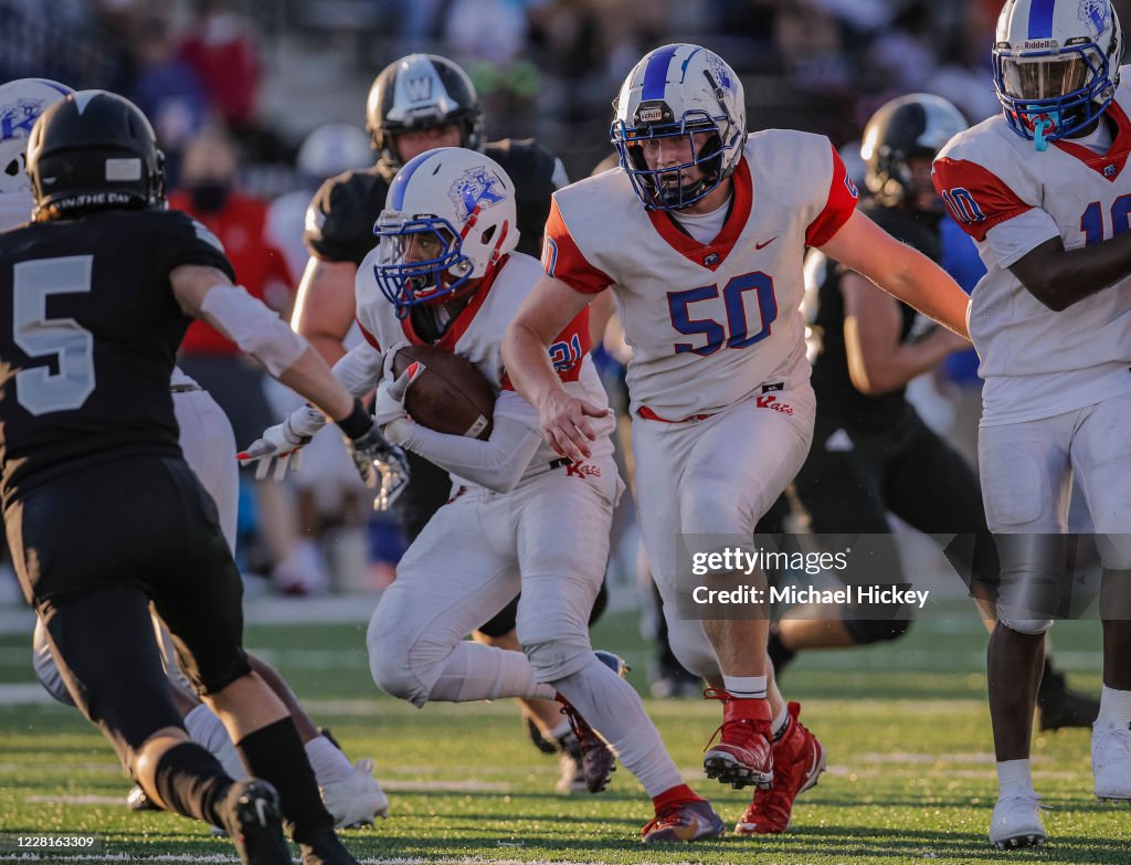Ta'Shy Stewart of the Kokomo Wildkats runs the ball during the game