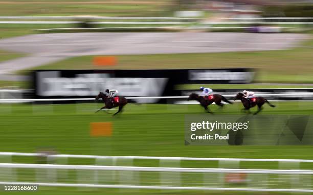 New Mandate ridden by jockey Rob Hornby wins the Betway Nursery Handicap ahead of Dandys Derriere and Martin Dwyer at Sandown Park Racecourse on...