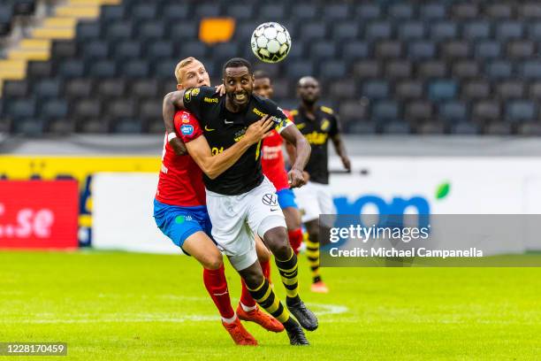 Captain Henok Goitom in a duel with Jakob Voelkerling of Helsingborgs IF during an Allsvenskan match between AIK and Helsingborgs IF at Friends Arena...