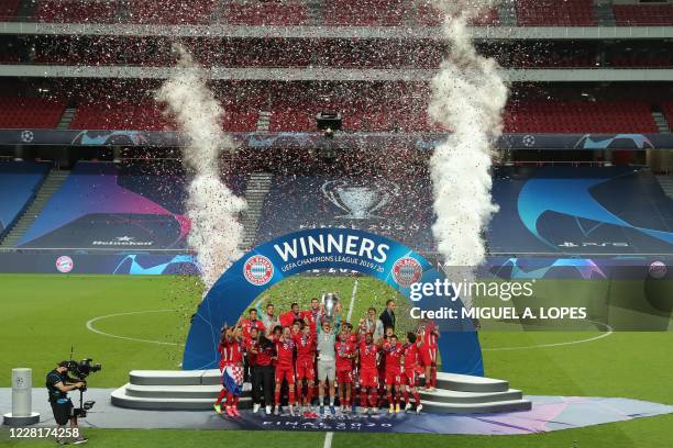 Bayern Munich players celebrate with the trophy after the UEFA Champions League final football match between Paris Saint-Germain and Bayern Munich at...