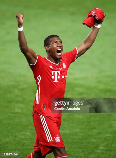 David Alaba of Bayern Munich celebrates at the end of the UEFA Champions League final football match between Paris Saint-Germain and Bayern Munich at...