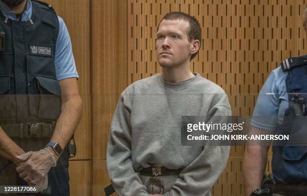 Australian white supremacist Brenton Tarrant attends his first day in court in Christchurch on August 24, 2020. - Tarrant, who murdered 51 Muslims in...