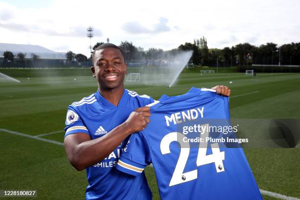 Nampalys Mendy poses with a shirt as he signs a contract extension with Leicester City at the Leicester City Belvoir Drive Training Complex on August...