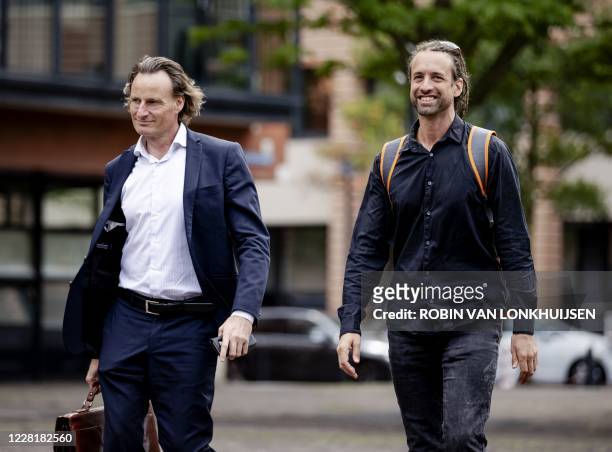 Jeroen Pols and Willem Engel arrive at the court to claim documents on behalf of the Virus Truth Protest Group that form the basis of the corona...