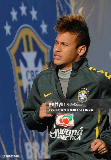 Brazilian footballer Neymar arrives for a training session on July 5 in Campana, 70 Km north from Buenos Aires. Brazil faces Paraguay next July 9 in...