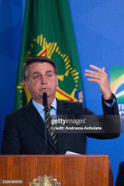 Jair Bolsonaro, President of Brazil, gestures during the "Brazil Vencendo a COVID" event amidst the coronavirus pandemic at the Planalto Palace on...