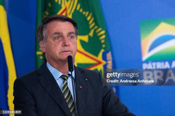 Jair Bolsonaro, President of Brazil, gets emotional during the "Brazil Vencendo a COVID" event amidst the coronavirus pandemic at the Planalto...