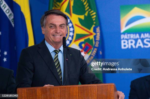 Jair Bolsonaro President of Brazil smiles during the Brazil "Brazil Vencendo a COVID" event amidst the coronavirus pandemic at the Planalto Palace on...