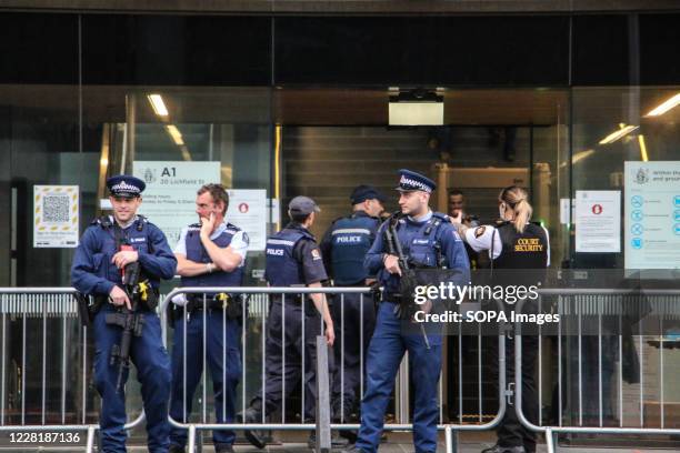 Units and armed police stand on guard at the main entrance of the High Court in Christchurch where Australian white supremacist Brenton Tarrant's...