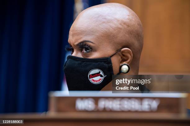 Representative Ayanna Pressley , is seen as U.S. Postal Service Postmaster General Louis DeJoy testifies during a hearing before the House Oversight...