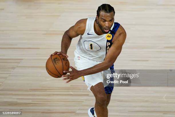 Warren of the Indiana Pacers drives up the court against the Miami Heat during the second half of a first round playoff game at The Field House at...