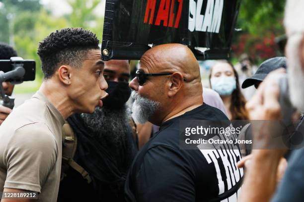 Republican National Convention protesters and counter protesters clash at the Resist RNC 2020 protest rally at Marshall Park on August 24, 2020 in...