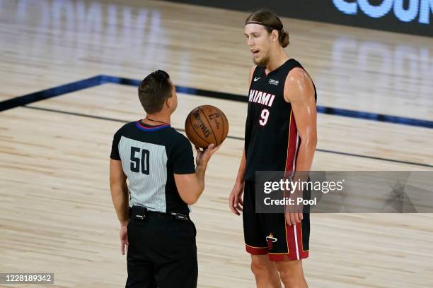 Kelly Olynyk of the Miami Heat speaks with an official during the first half against the Indiana Pacers of a first round playoff game at The Field...