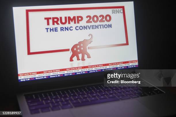 Logo is displayed at the start of the Republican National Convention seen on a laptop computer in Tiskilwa, Illinois, U.S., on Monday, Aug. 24, 2020....