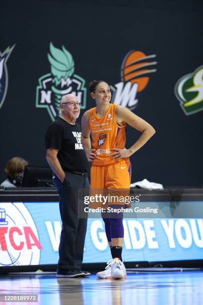 Mike Thibault of the Washington Mystics and Diana Taurasi of the Phoenix Mercury share a laugh during the game on August 23, 2020 at the Feld...