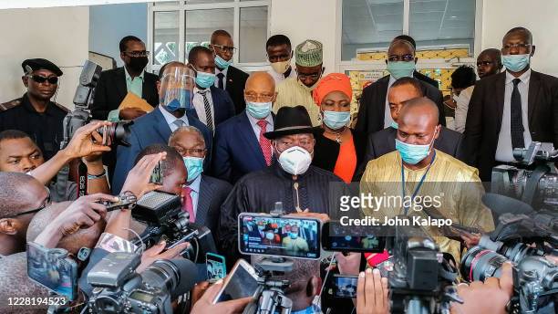 Mediator, former President of Nigeria, Goodluck Jonathan speaks to the press after leading talks with Western African envoys and the military junta...
