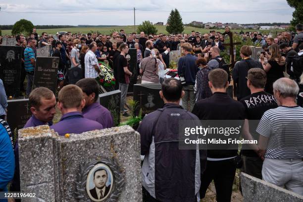 Priest reading Nikita Krivtsov's final rights on August 25, 2020 in Maladzyechna, Belarus. The public funeral takes place of Nikita Krivtsov, a...