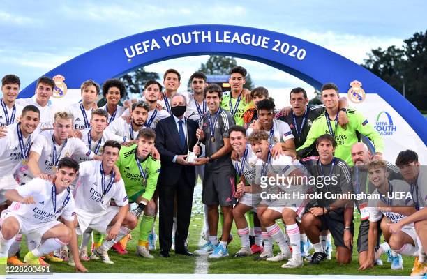 Real Madrid players celebrate with the Presdient Florentino Perez and head coach Raul Gonzalez Blanco following the UEFA Youth League Final 2019/20...