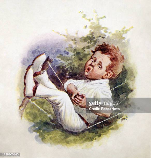 Vintage illustration depicting a young boy caught on barbed wire whilst fielding a ball during a cricket match, circa 1930.