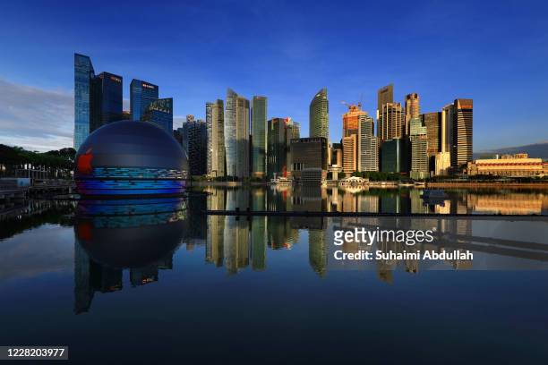 General view of the new Apple flagship store against the city skyline at Marina Bay Sands waterfront on August 26, 2020 in Singapore. The store...