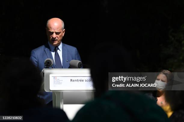 French Education, Youth and Sports Minister Jean-Michel Blanquer speaks flanked by French Junior Sports Minister Roxana Maracineanu as he delivers a...