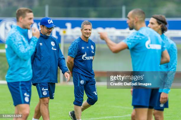 Head coach David Wagner of FC Schalke 04 and Athletic coach Werner Leuthard of FC Schalke 04 look on during the FC Schalke 04 Training Camp on August...