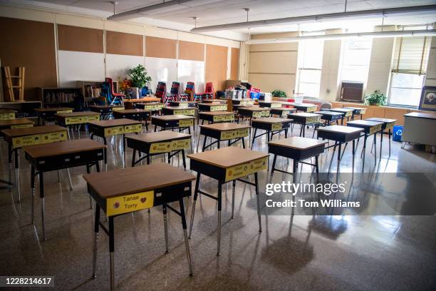 An empty classroom is pictured at Heather Hills Elementary School as officials conduct a materials distribution for parents to pick up for distance...