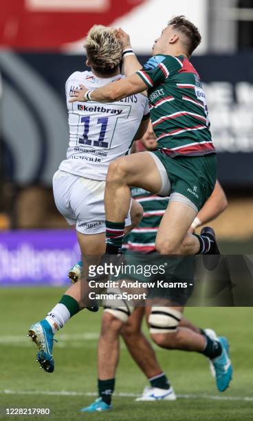 David Williams of Leicester Tigers competing in the air with Ollie Hassell-Collins of London Irish during the Gallagher Premiership Rugby match...