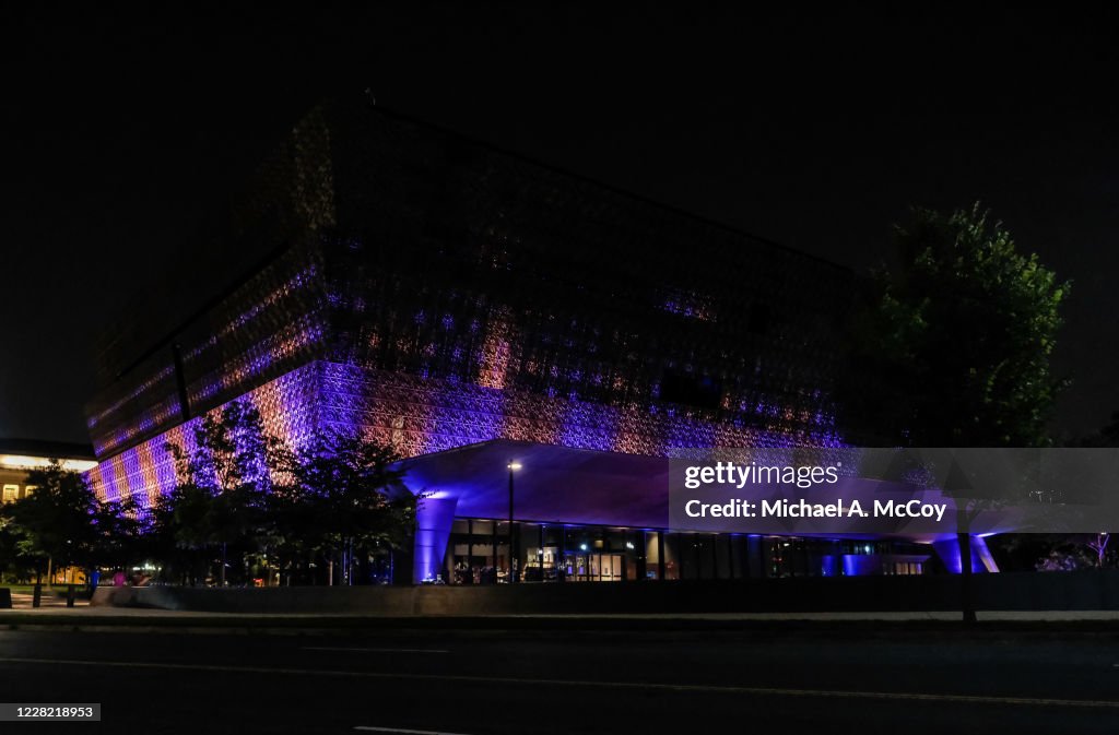 Buildings Across The Nation Are Illuminated In Purple And Gold To Mark 19th Amendment Centennial