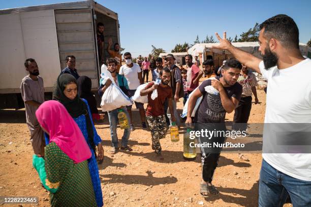 Food distribution in Syrian refugee from Uk charity Proactive Support in informal settlements in Makni refugee camp on August 21 2020 , Lebanon