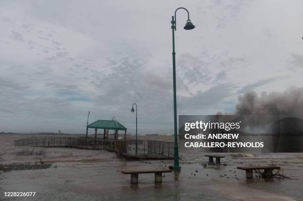 Smoke rises from a burning chemical plant after the passing of Hurricane Laura in Lake Charles, Louisiana on August 27, 2020. - Hurricane Laura...