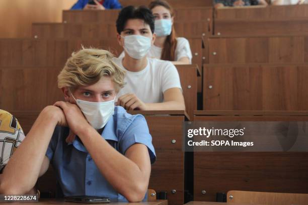 Students wearing face masks as a precaution during the meeting. By September 1st many Russian universities will traditionally start classes with...