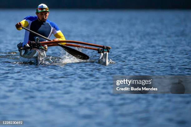 Para Athlete Luis Carlos Cardoso exercises during a training session at the Billings reservoir on August 27, 2020 in Sao Bernardo do Campo, Brazil....