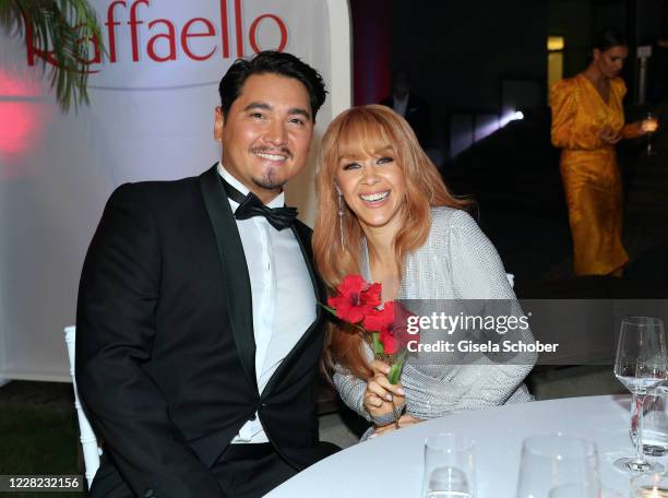 Erich Klann and his wife Oana Nechiti during the Raffaello Summer Dinner at Koenigliche Porzellan Manufaktur on August 27, 2020 in Berlin, Germany.