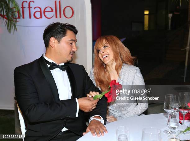 Erich Klann and his wife Oana Nechiti during the Raffaello Summer Dinner at Koenigliche Porzellan Manufaktur on August 27, 2020 in Berlin, Germany.