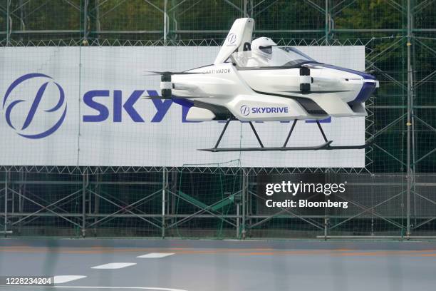 The SkyDrive Inc. SD-03 flying car is test-flown during a demonstration to the media at the Toyota Test Field in Toyota City, Aichi Prefecture,...