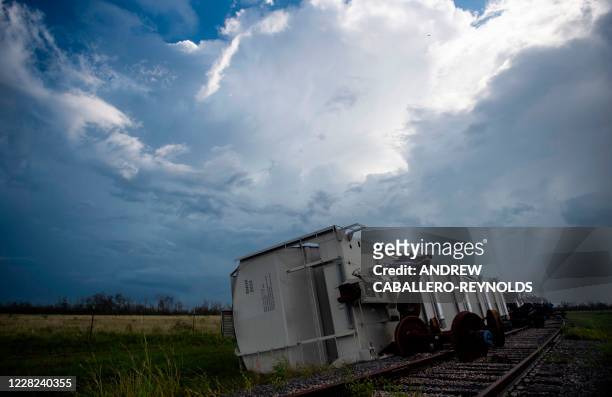 Train lies on the side of the tracks after it derailed after the passing of Hurricane Laura near Lake Charles, Louisiana on August 28, 2020. - At...