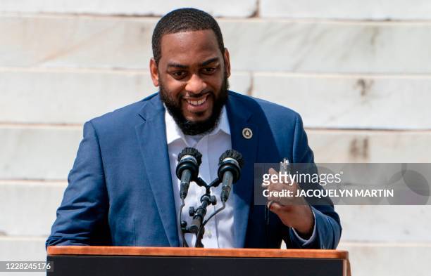 Kentucky state Rep. Charles Booker speaks during the "Commitment March: Get Your Knee Off Our Necks" protest against racism and police brutality, on...