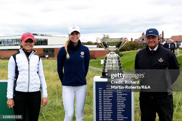Aline Krauter of Germany and Annabell Fuller of England pose with the trophy and the starter on the 1st tee prior to the Final on Day Five of The...