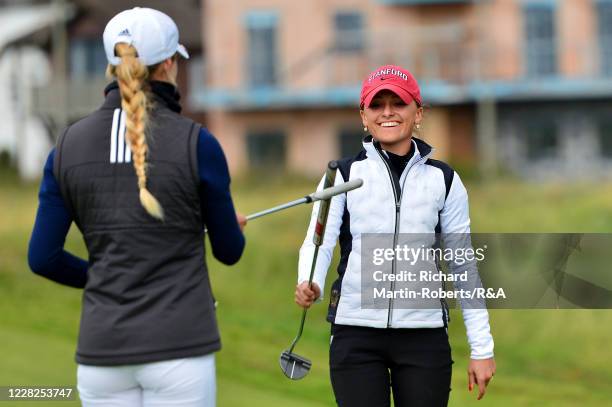 Aline Krauter of Germany is congratulated by Annabell Fuller of England on the 18th green after her victory during the Final on Day Five of The...