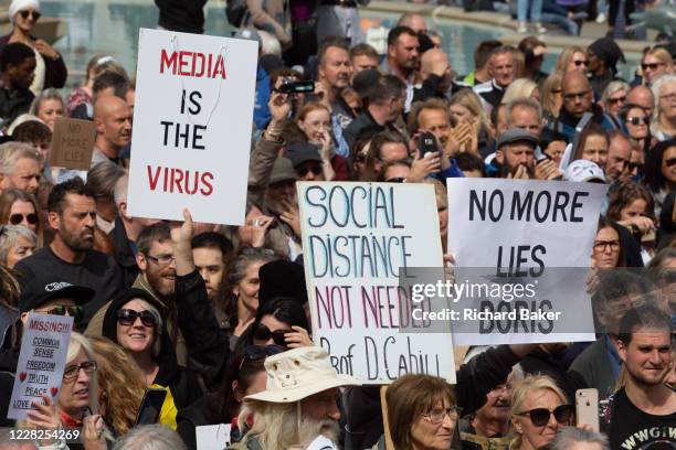 Anti-lockdown conspiracy theorists and Coronavirus deniers protest in Trafalgar Square for personal freedoms and against the government and...