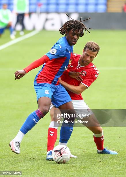 Adam Matthews of Charlton Athletic and Eberechi Eze of Crystal Palace battling for possession during the Pre-season Friendly match between Crystal...